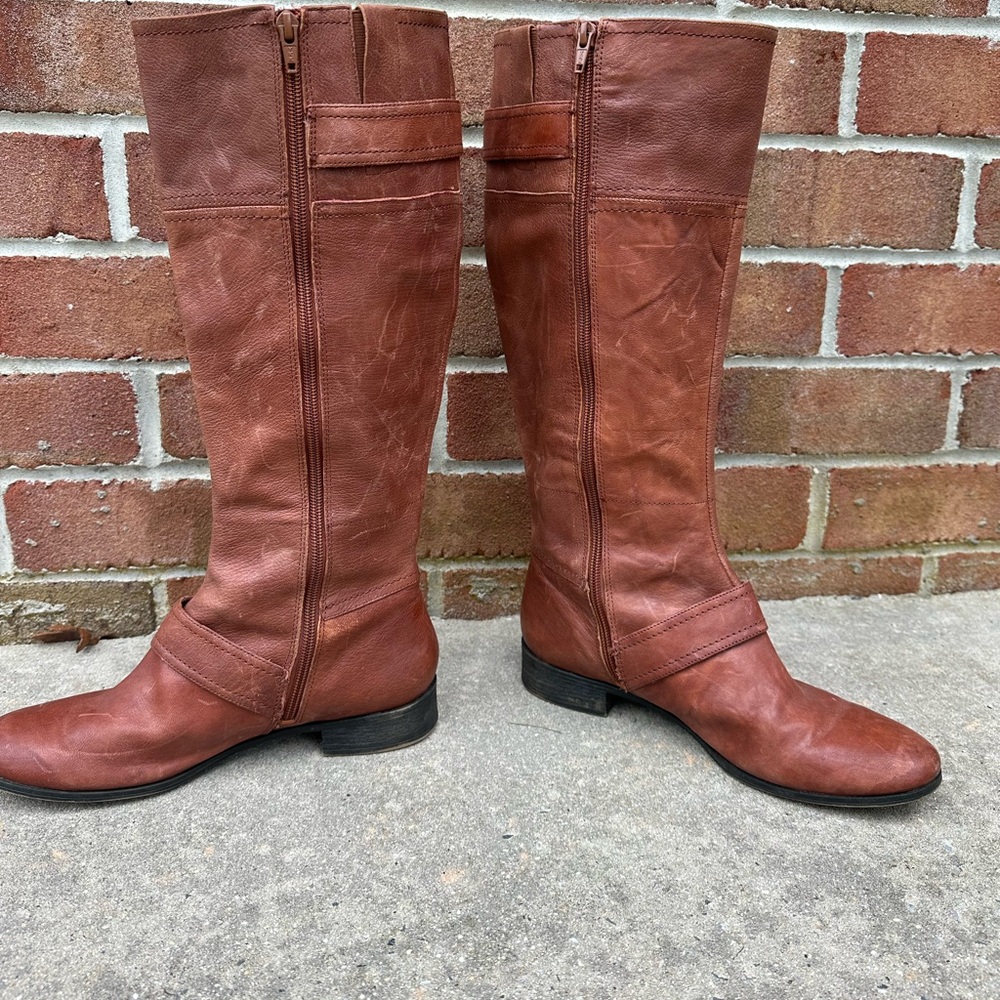 Rose beige leather  knee high boots with buckles and zip. One inch heel